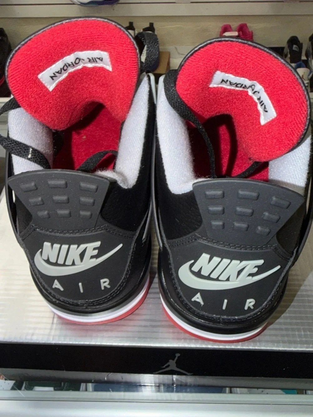 Jordan Men’s Black/Red/White Retro 4 Sneakers